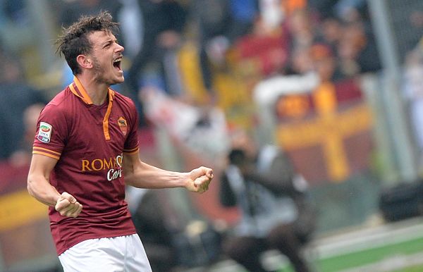 AS Roma's Alessandro Florenzi celebrates after scoring the 1-0 during the Serie A soccer match between AS Roma and Genoa at the Olimpico stadium in Rome, Italy, 12 January 2014.  ANSA/ETTORE FERRARI